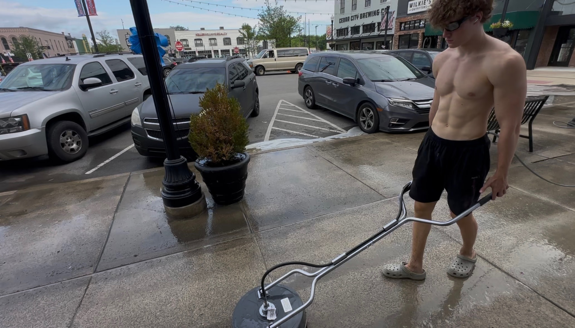 Technician surface cleaning a downtown Lebanon sidewalk